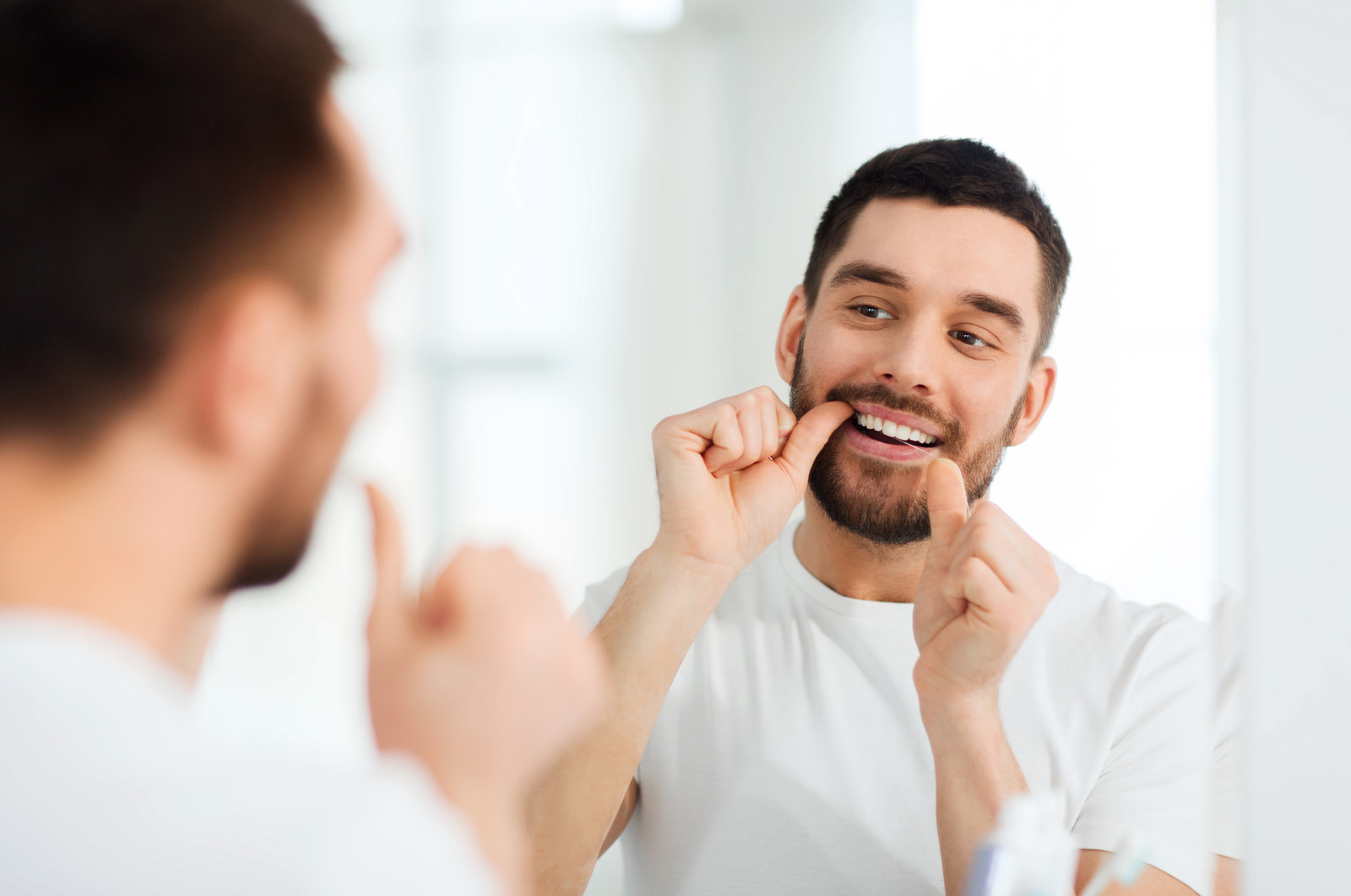 benefits-of-regularly-flossing-your-teeth